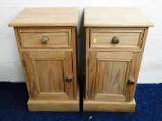 A pair of matching pine bedside cabinets, 25in hig