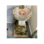 A stone bird bath, 25.75in tall