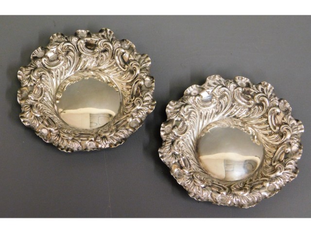 A pair of embossed Victorian 1895 Sheffield silver