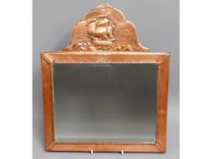 A c.1900 Newlyn style copper arts & crafts mirror