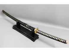 A mounted Japanese samurai sword, 45.5in long