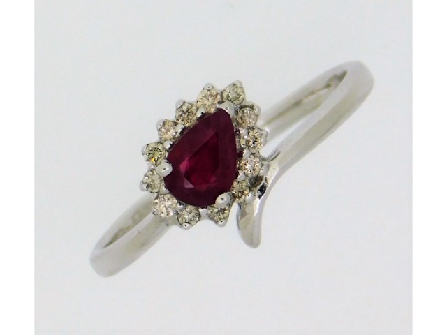 A 9ct white gold ring set with ruby & approx. 0.13