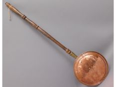 A Victorian copper warming pan, 41in long