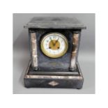 A Victorian slate mantle clock with marble columns
