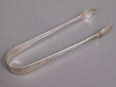 A pair of Georgian 1815 London silver sugar tongs