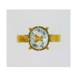 An early Victorian 22ct gold ring with date mark f