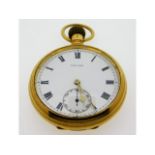 A Trojan 18ct gold top wind antique pocket watch 93.7g, 50mm wide, runs when wound