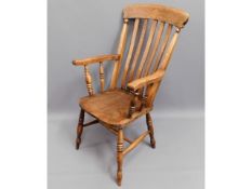 An antique elm seated antique Windsor style chair,