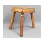 An oak rustic milking stool, 13in tall