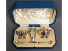 An art deco cased 1937 London sliver cruet set by