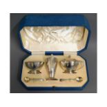 An art deco cased 1937 London sliver cruet set by