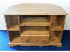 A corner pine tv cabinet, 36in wide x 25in high x