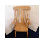 A modern beech Windsor style armchair, 44.25in hig