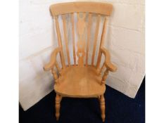 A modern beech Windsor style armchair, 44.25in hig