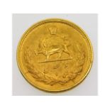 A gold Iranian half Pahlavi coin, 4.2g