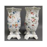 A pair of 19thC. continental porcelain vases on fi