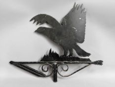 A weather vane styled as an eagle, 24.5in wide x 2