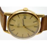 A gents 9ct gold Omega automatic wrist watch with