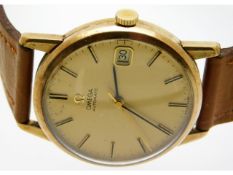 A gents 9ct gold Omega automatic wrist watch with