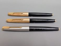 Three vintage Parker fountain pens including a Parker 61