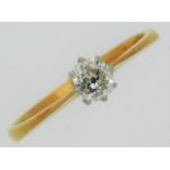 An antique 18ct gold diamond ring set with old cut