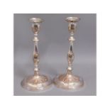 A pair of 19thC. silver plate on copper candle sti