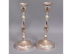 A pair of 19thC. silver plate on copper candle sti