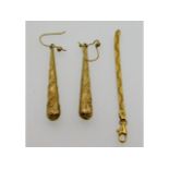 A pair of 9ct gold earrings (tested) & a part of a
