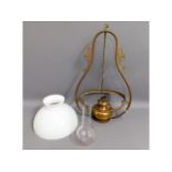 A decorative hanging ceiling light with glass shad