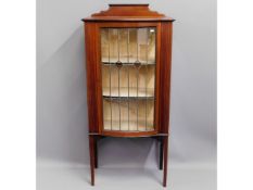 An Edwardian mahogany glazed display cabinet, 51.7