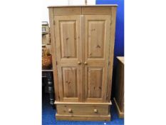 A pine wardrobe, 68in high x 32in wide x 22.75in d