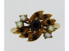 A 1960's 9ct gold garnet & pearl ring, 3.9g, size