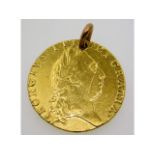 A 1793 George III 22ct gold guinea with pierced mo