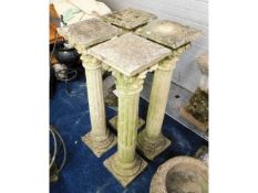 Four reconstituted stone Corinthian columns, 40in