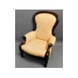 A Victorian upholstered walnut arm chair, 41in hig