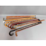 A quantity of ten walking sticks & aids including