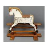 A small child's rocking horse, 32in long x 27.5in