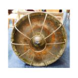 An iron pig feeder, 36in diameter