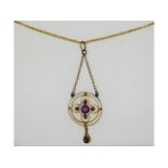 A 9ct Edwardian pendant with 16in chain set with a