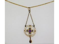 A 9ct Edwardian pendant with 16in chain set with a