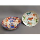 A c.1800 Chinese porcelain plate hand decorated with dogs, 8.25in diameter, (small crack to edge) tw