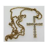 A 9ct gold necklace with cross set with 0.25ct dia