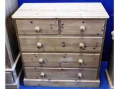 A pine chest with five drawers, 36in wide x 35.5in