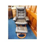 A Stressless style leather armchair & stool