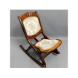 An Edwardian style mahogany folding child's rockin