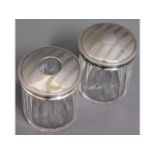 A pair of art deco dressing table tidies with Lond