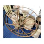 Two large iron cart wheels, 47.5in diameter