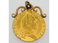 A 1790 mounted George III 22ct gold guinea, 9.6g