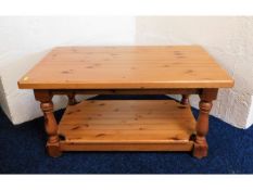 A stained pine coffee table, 36in wide x 22in deep
