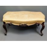 An antique upholstered stool, 36in wide x 20in dee